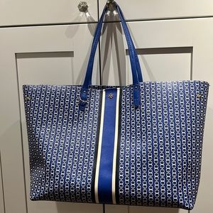C Wonder large tote with snap and interior large zip pocket.